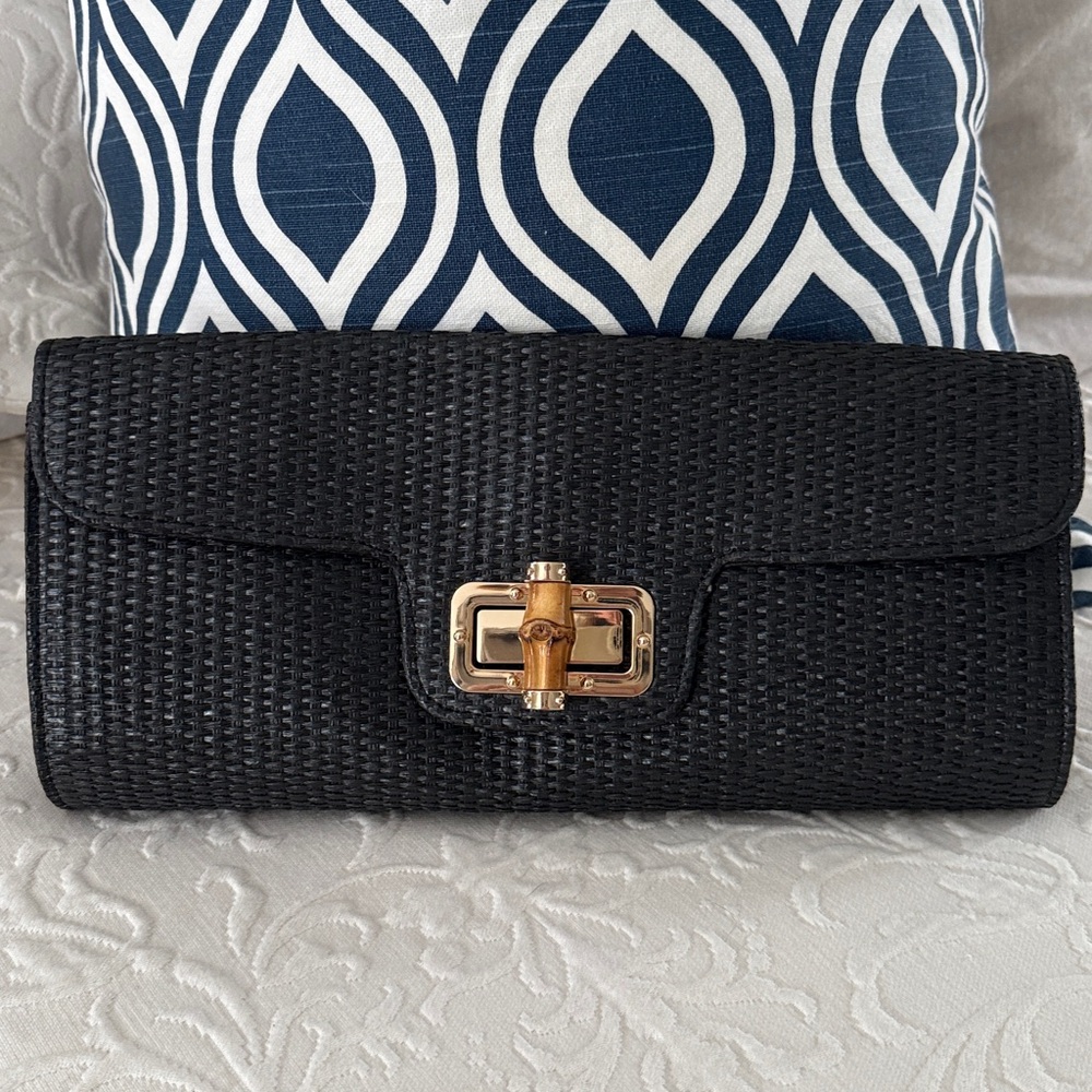 Chic Black Straw Clutch with Sleek Design and Elegant Clasp